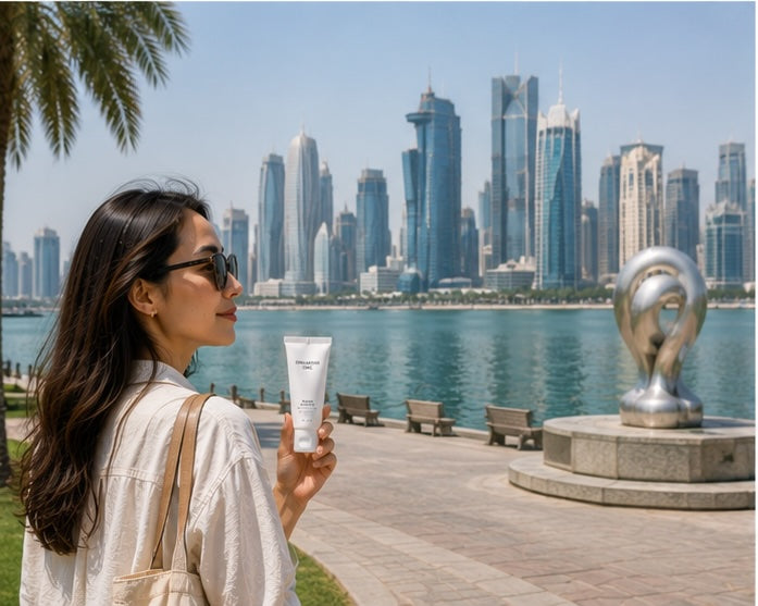 Doha travel skincare with Singapore Girl along the Corniche overlooking the Qatar city skyline