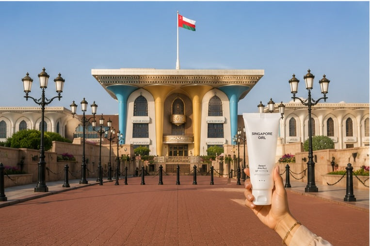 Muscat travel skincare with Singapore Girl at Al Alam Palace during a sunny sightseeing day in Oman