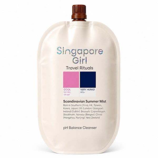 Singapore Girl Travel Rituals Scandinavian Summer Mist pH Balance Cleanser in a flexible refill pouch with a brown cap, on a white background.