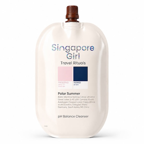 A white squeeze sachet of Singapore Girl Travel Rituals Polar Summer pH Balance Cleanser with a brown cap, shown on a clean white background.