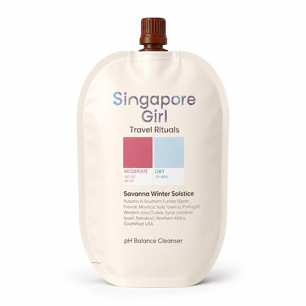 Singapore Girl Travel Rituals Savanna Winter Solstice pH Balance Cleanser in a flexible refill pouch with a brown flip-top cap, shown on a clean white background.