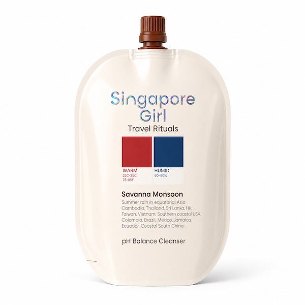 Singapore Girl Travel Rituals Savanna Monsoon pH Balance Cleanser in a 16oz squeeze pouch with a brown cap, on a white background.