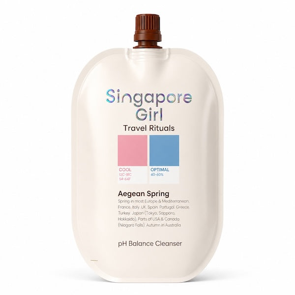 Singapore Girl Travel Rituals AegEAN Spring pH Balance Cleanser in a large cream-colored squeeze pouch with a brown cap, shown on a white background.