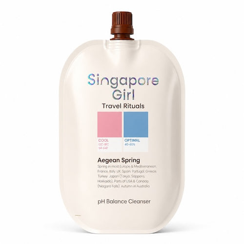 Singapore Girl Travel Rituals AegEAN Spring pH Balance Cleanser in a large cream-colored squeeze pouch with a brown cap, shown on a white background.