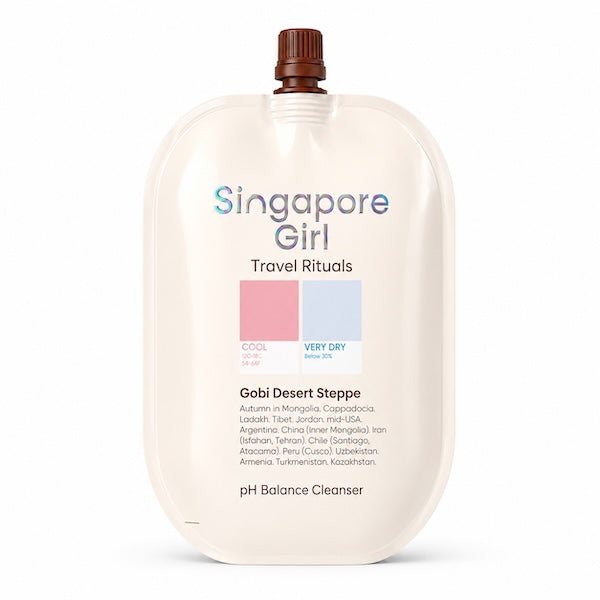 Singapore Girl Travel Rituals Gobi Desert Steppe pH Balance Cleanser in a large, rounded off-white squeeze pouch with a brown cap, shown on a white background.