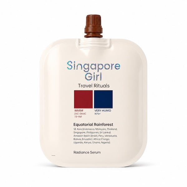 Singapore Girl Travel Rituals Equatorial Rainforest Radiance Serum travel pouch with a brown cap, on a white background.