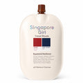 A single pump bottle of Singapore Girl Travel Rituals Equatorial Rainforest pH Balance Cleanser, featuring a cream-colored body, a brown cap, and a color swatch graphic on the front.